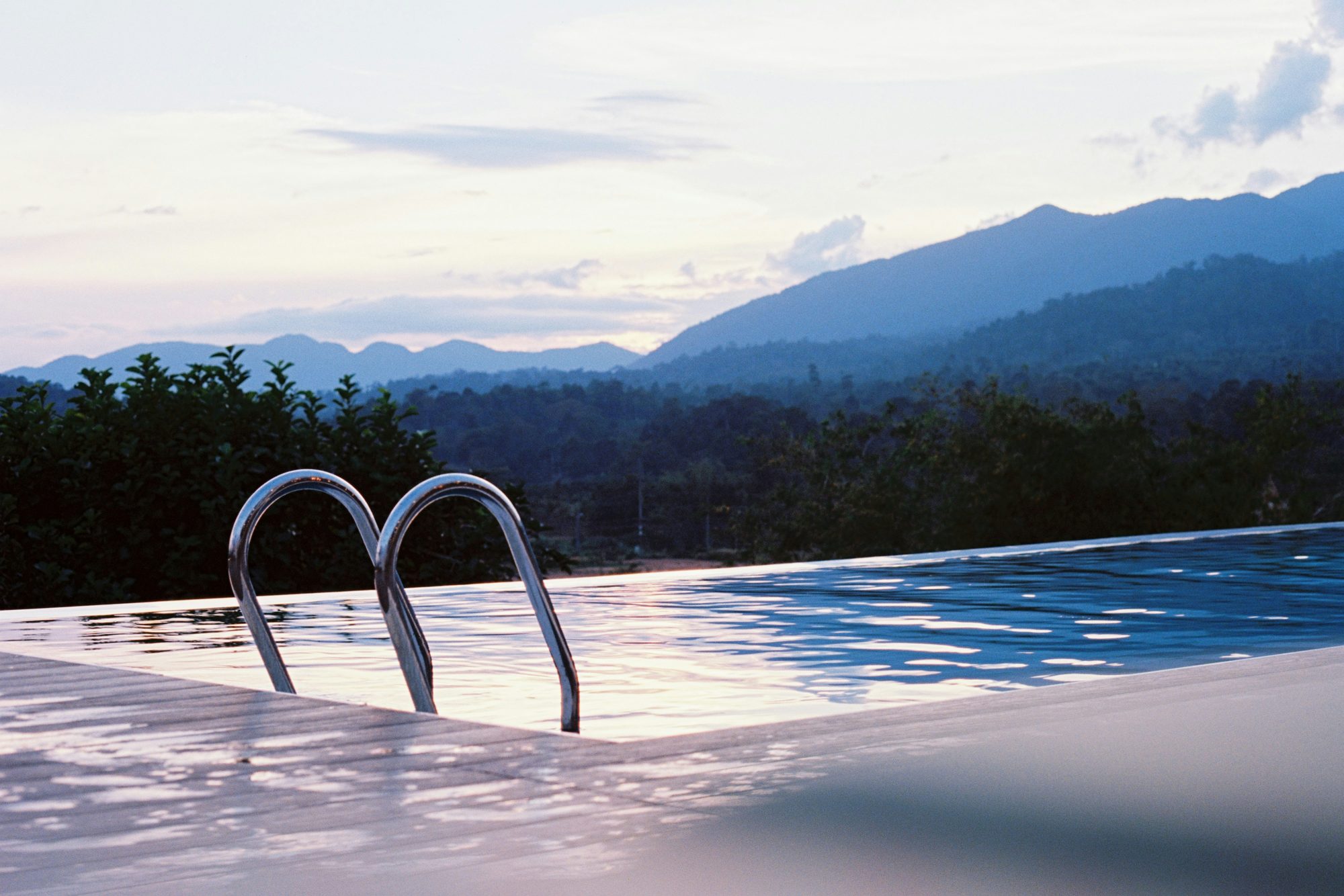 Infinity swimming pool at dusk